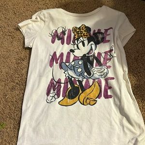 White with Minnie Mouse and purple writing saying Minnie